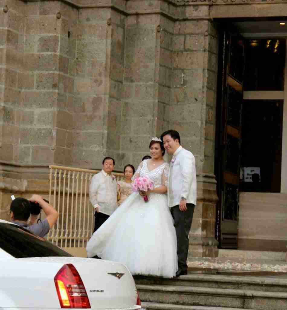 A wedding happening at the Manila Cathedral, Intramurous