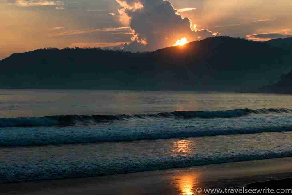 Sun playing hide and seek, Sabang Beach, Baler