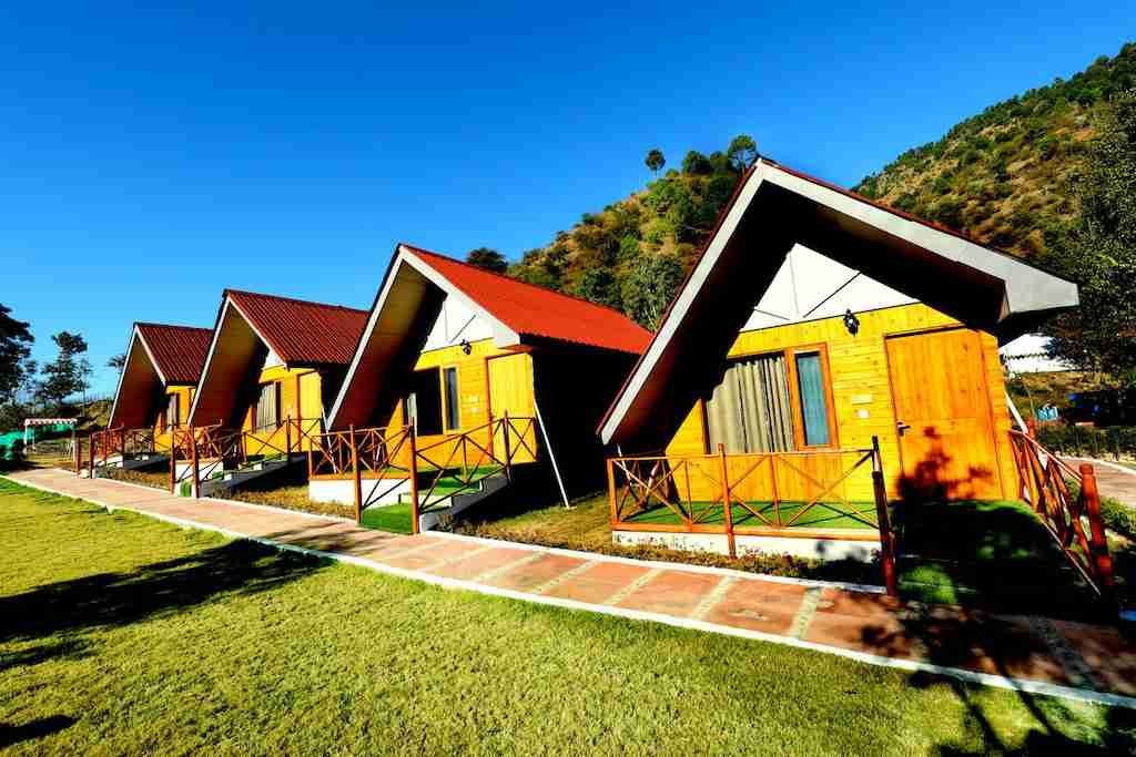 Stay in Swiss tents or well-furnished cottages at Banjara Mountain Retreat, Chail, Himachal