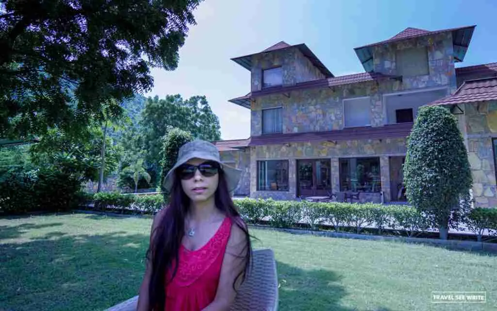 Lawns outside the indoor and outdoor restaurant area of the resort