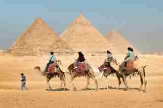 Visiting the Pyramids of Giza - Photo by Photo by Murat Şahin