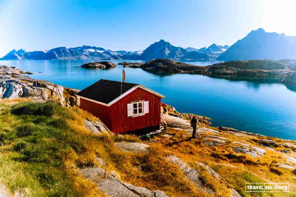 Qernertivartiit Island, once a vibrant village, now lies abandoned in East Greenland and Sermilik Fjords.