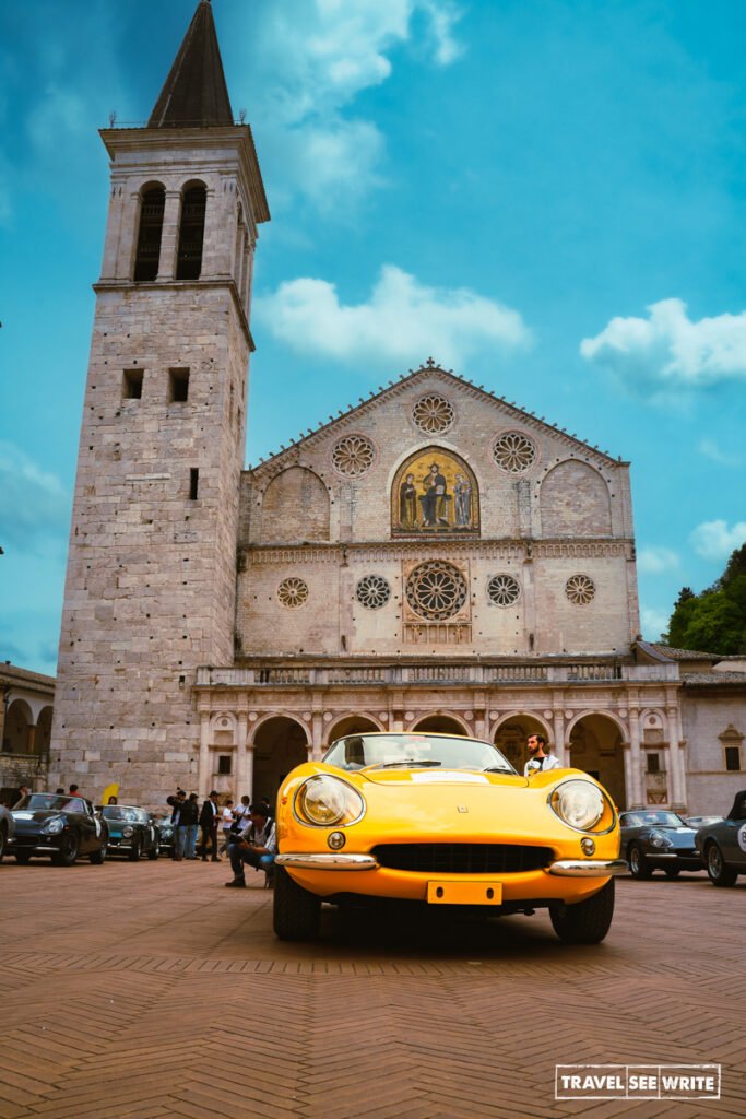 32 classic Ferrari 275s from around the world neatly parked at Piazza del Duomo, Spoleto, Umbria, Italy