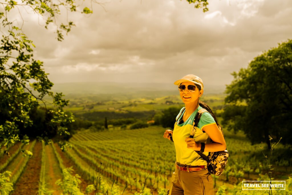 Walking a small stretch on Via Francigena through vineyards, Tuscany, Italy